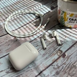 Apple AirPods with charging case (wired).
